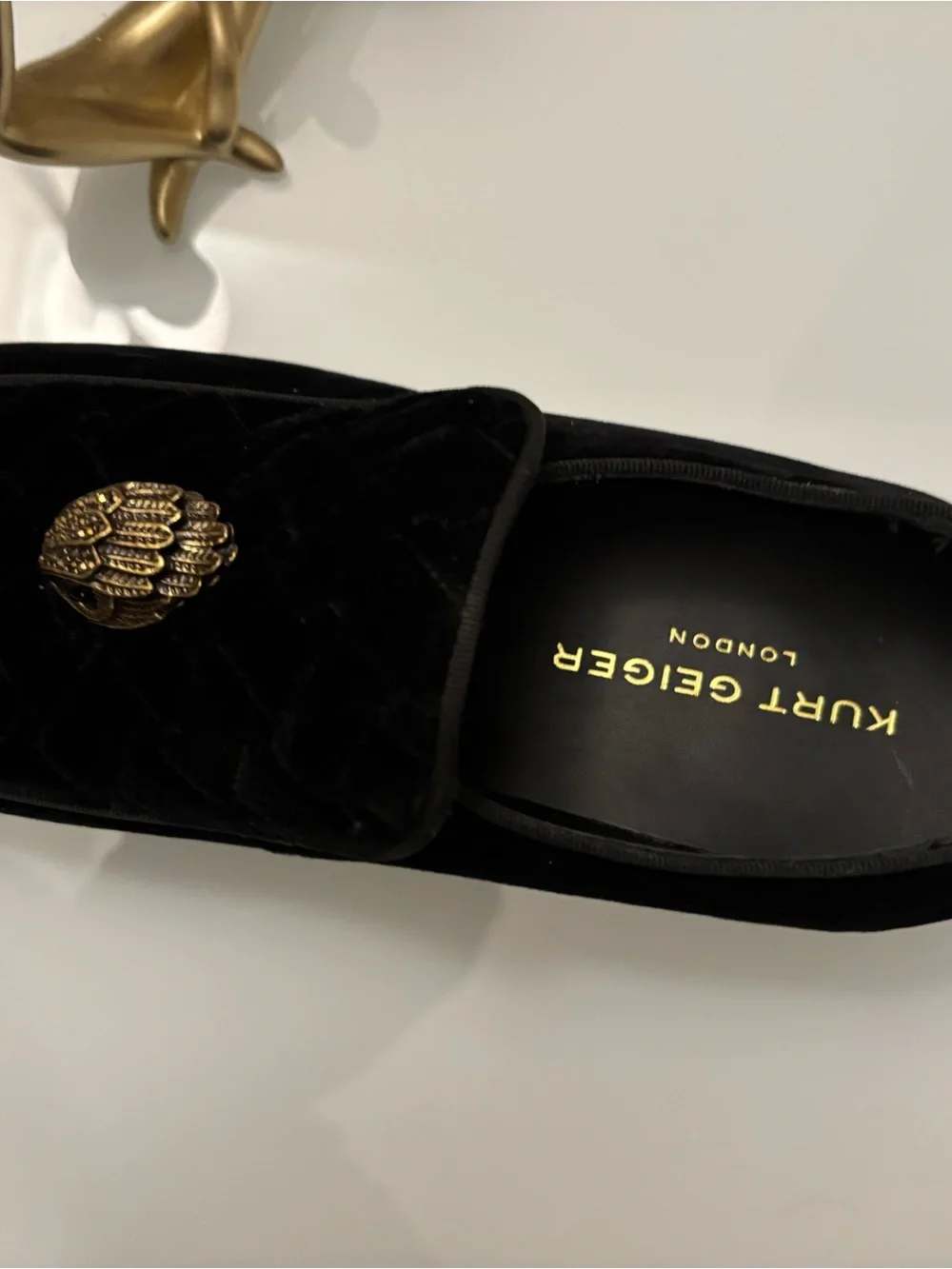 Kurt Geiger Black Velvet Slip-On Loafers with Ornate Gold Emblem